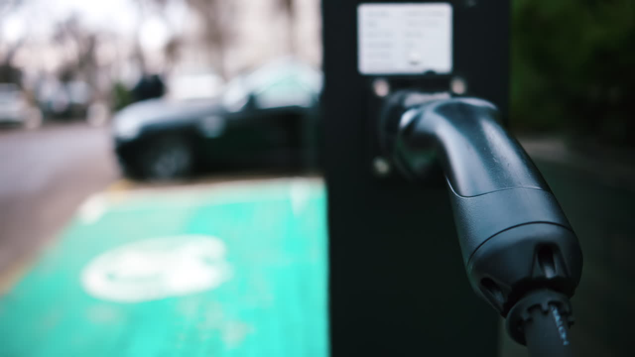Futuristic black outdoor charging station for electric vehicles