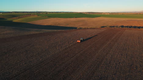 tractor planting in a rural landscape