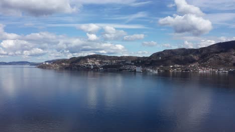 forward moving aerial of eidsvaagneset outside bergen - beautiful weather and sky - norway