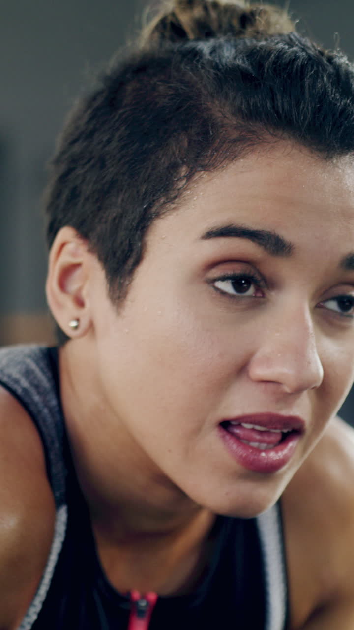 Close Up of Tired Woman Sweating After Intense Workout