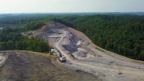 an aerial over a mountaintop removal coal strip mine in west virginia 2