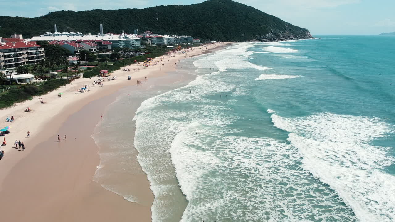 A captivating aerial view captured by drone, showcasing the stunning beauty of Praia Brava, Florian&oacute;polis, with its pristine shoreline and azure waters
