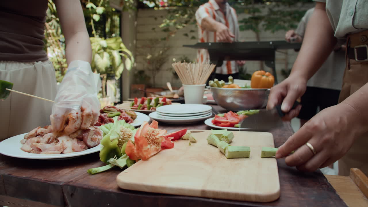 Group of Friends Barbecuing in Backyard
