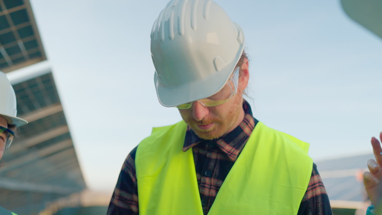 Engineers Working on Solar Panels