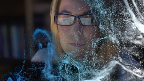 Wearing glasses, person with animation of digital data overlaying face