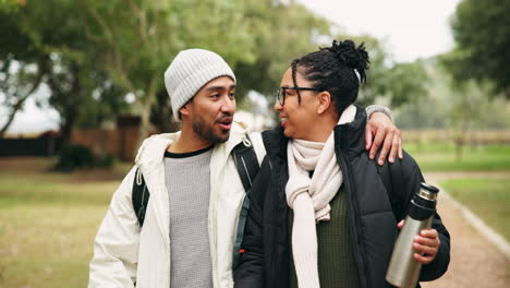 Outdoor,-hiking-and-couple-of-friends-hug