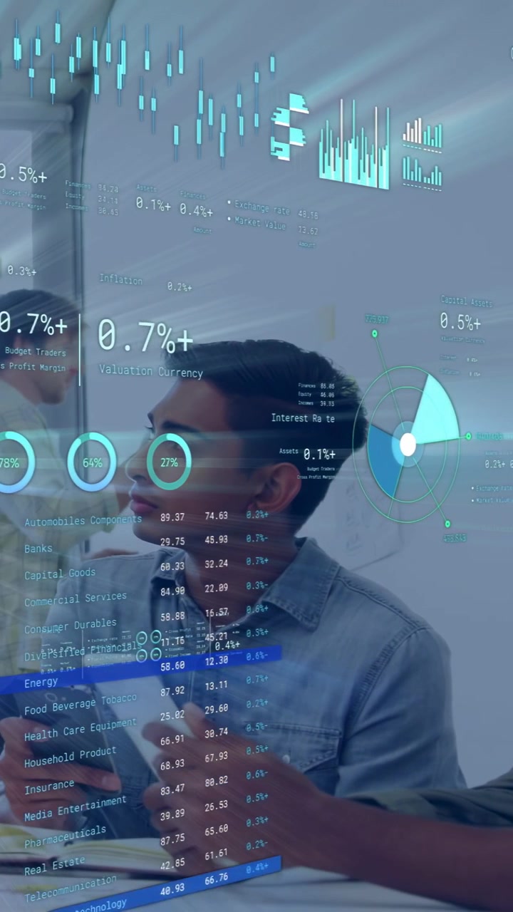 Vertical video: Seated man taking papers from colleague turning and reviewing AR finance charts