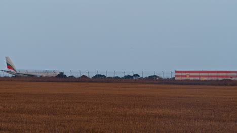 big jet plane taking off runway