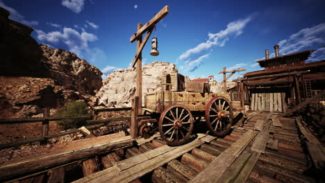 wooden wagon on a weathered structure under a blue sky