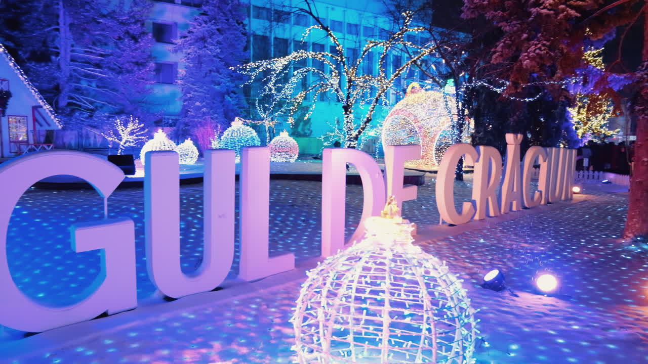 Christmas market sign in the snow in the city centre on Chisinau, Moldova