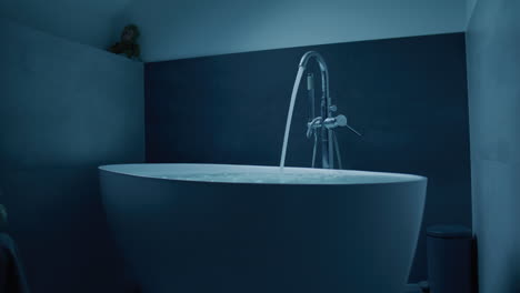 modern bathroom tub filling with water