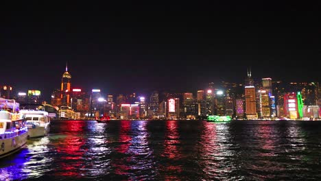 colorful lights reflecting on hong kong waters