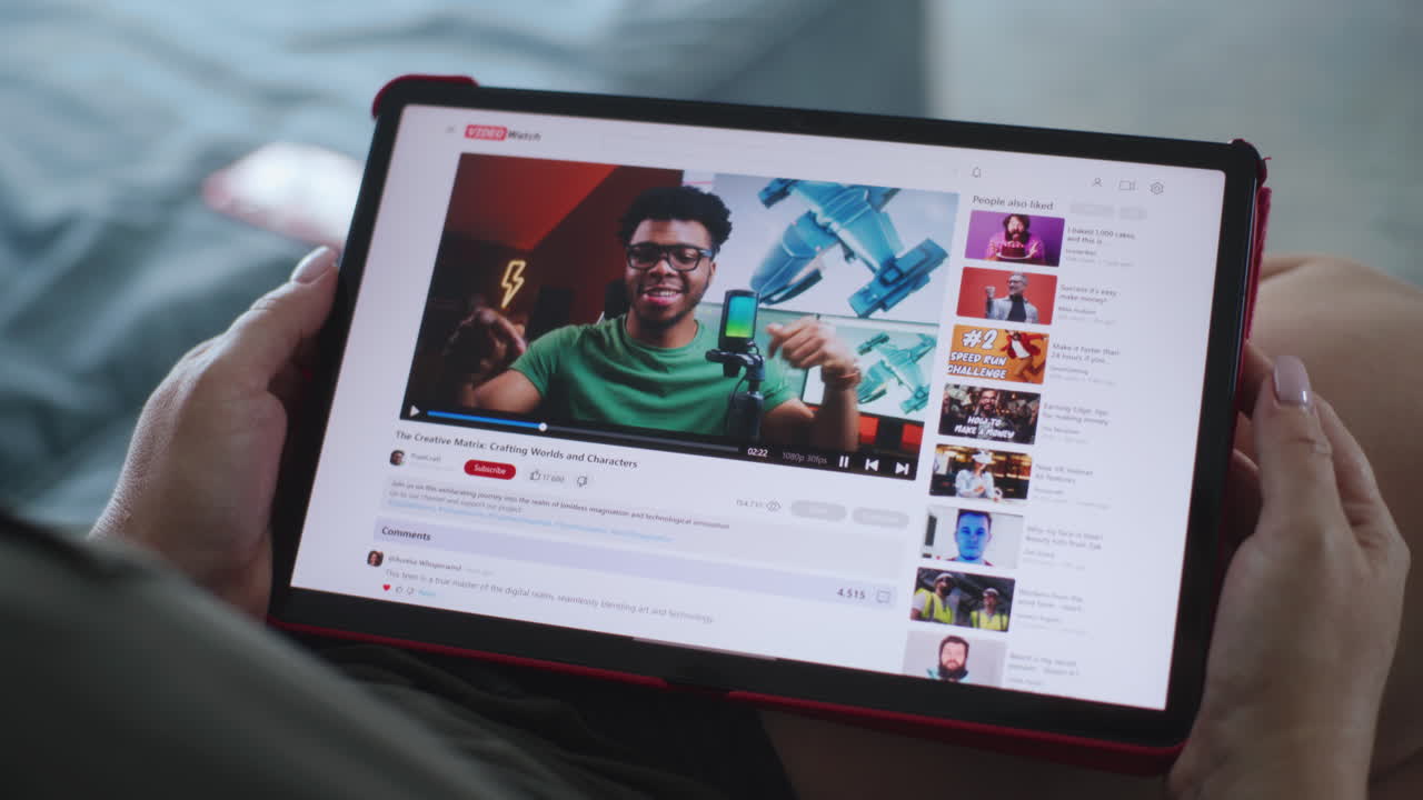 Person watching a video on a tablet