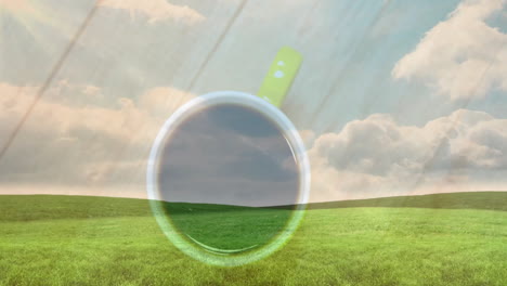 green-handled ceramic coffee cup floating above lush green meadow, hills under soft sunlight rays