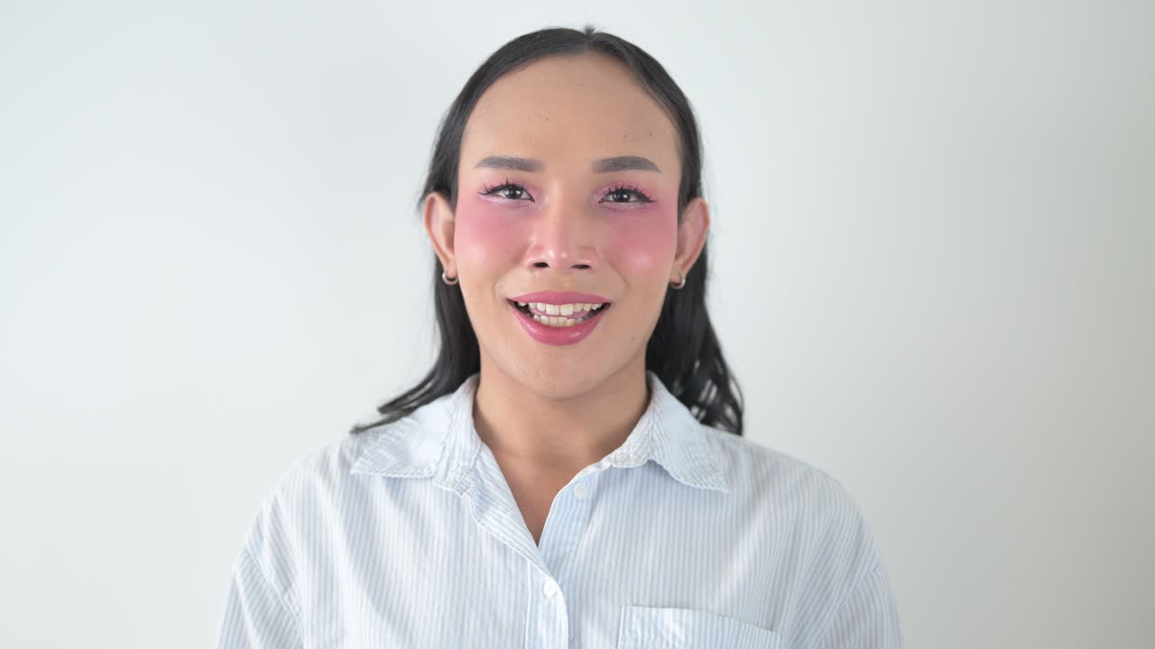 Portrait Thai transgender person representing gender diversity and inclusivity smiling at camera