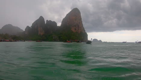 railay beach in krabi, thailand during a rainstorm