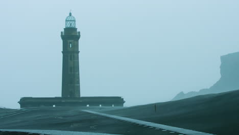 stunning close up shot of the ponta dos capelinhos lighthouse in a storm