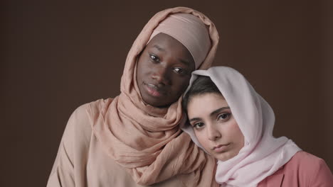 two women in headscarves