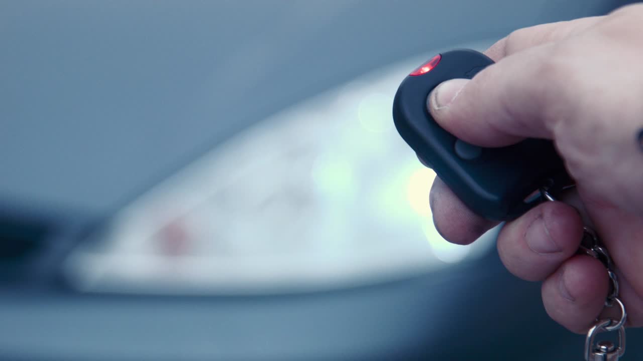 The Man Presses The Button Of The Security Alarm