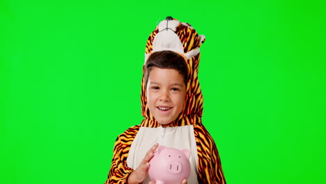 Piggy-bank,-face-and-child-in-a-studio-with-green