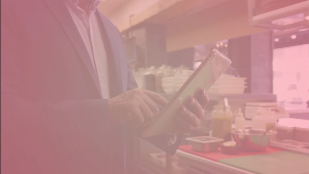 Manager tapping tablet in kitchen, animating charts and tracking staff, shifting to recliner