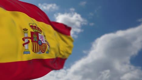 realistic spanish flag is waving slowly.