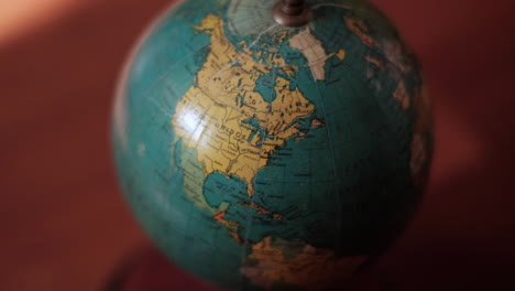 vintage globe with focus on north america in warm light, canada, usa, mexico regions