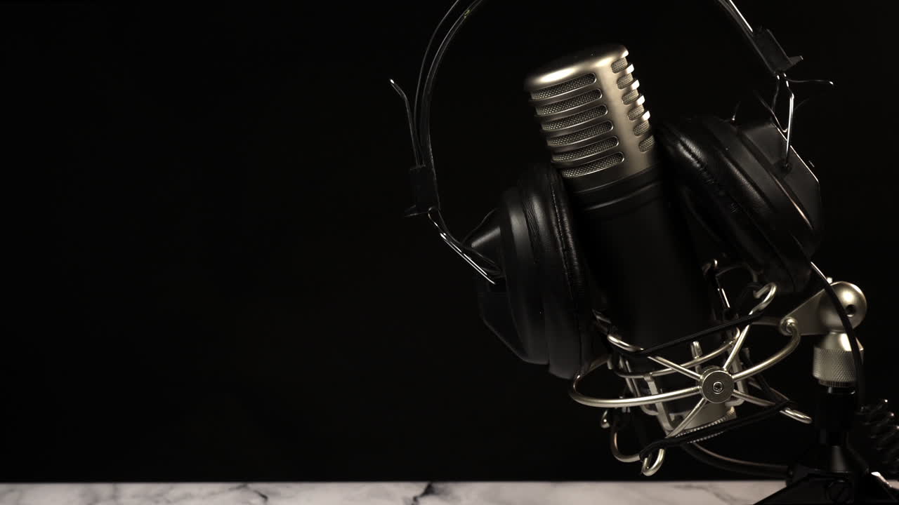 Professional Studio Microphone with Headphones on Dark Background