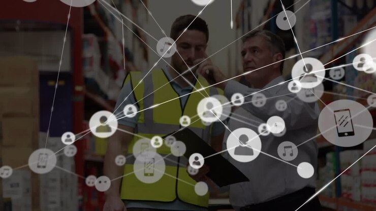 Animation of network of connections with icons over diverse people working in warehouse