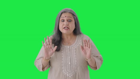 Angry-Indian-old-woman-shouting-at-someone-Green-screen