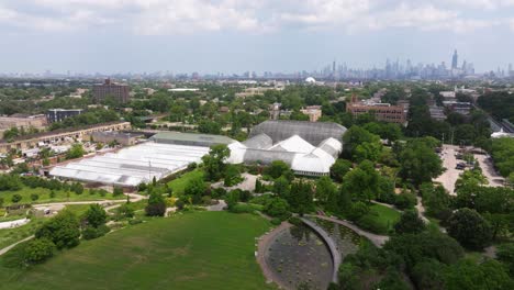 orbiting drone shot above garfield park conservatory