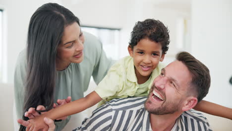 Happy,-playful-and-young-parents-with-kid