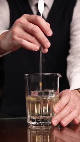 bartender preparing a cocktail