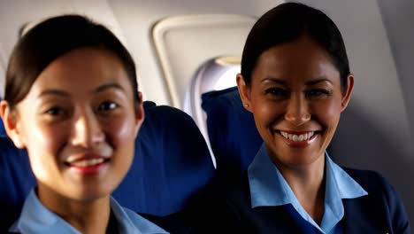 flight attendants on a plane