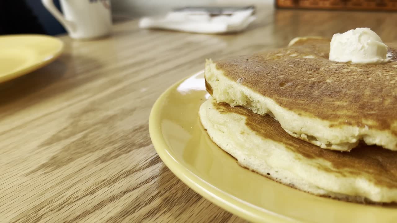 plate of appetizing pancakes with ice cream