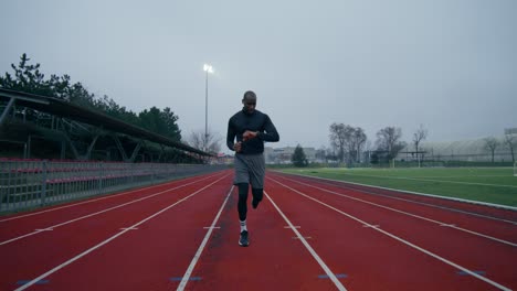 man running on a track