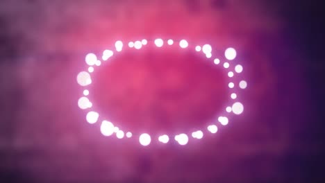 un óvalo brillante de luces de hadas sobre un fondo rosa