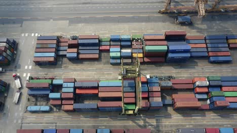 machinery stacking shipping containers