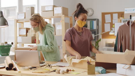 two women packing orders in a small business