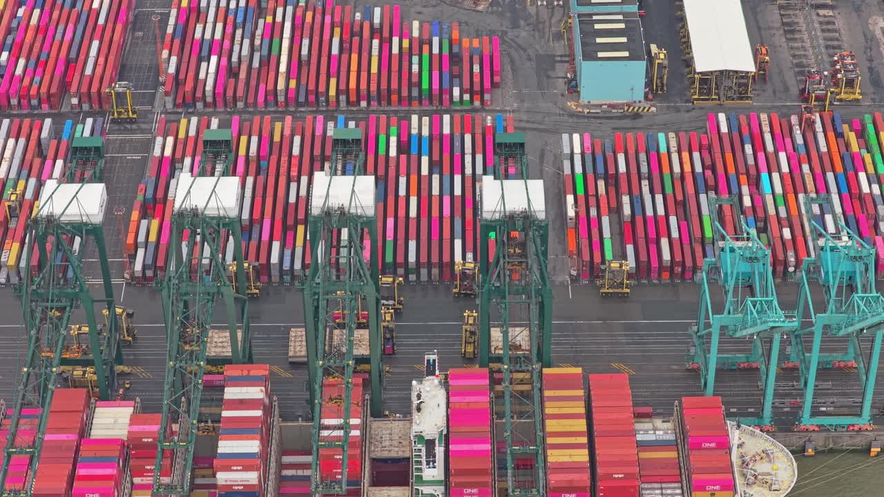 Drone scene of Antwerp seaport, cargo vessels and logistics, Belgium