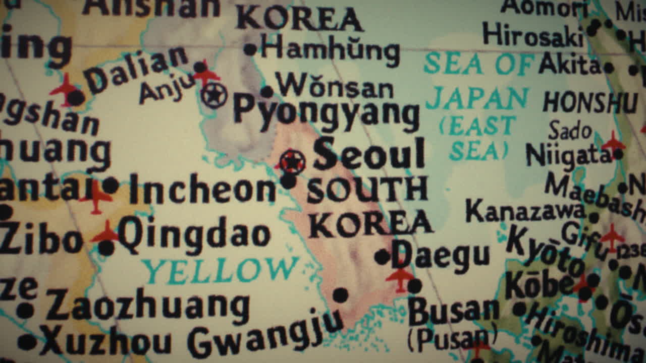 A close-up view of a world map showing the Korean Peninsula, Japan, and parts of China