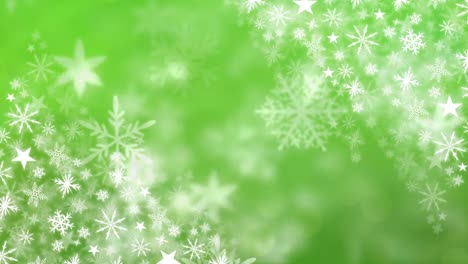 Snowflakes-falling-with-green-background