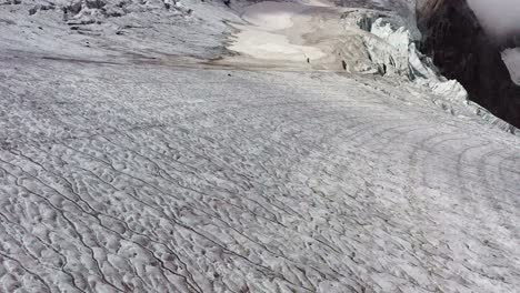 Drone-flight-over-the-slowly-dying-Steingletscher-in-the-Sustenpass-region-of-the-Swiss-Alps-at-2'800m-in-Switzerland