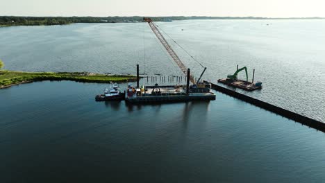 A-slow-rotation-around-a-floating-crane-on-a-barge