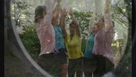 exercising outdoors, women raising hands in celebration, feeling joyful and animated