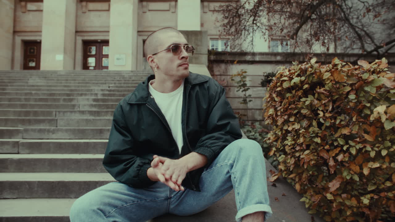 Stylish Man Sitting on Stairs