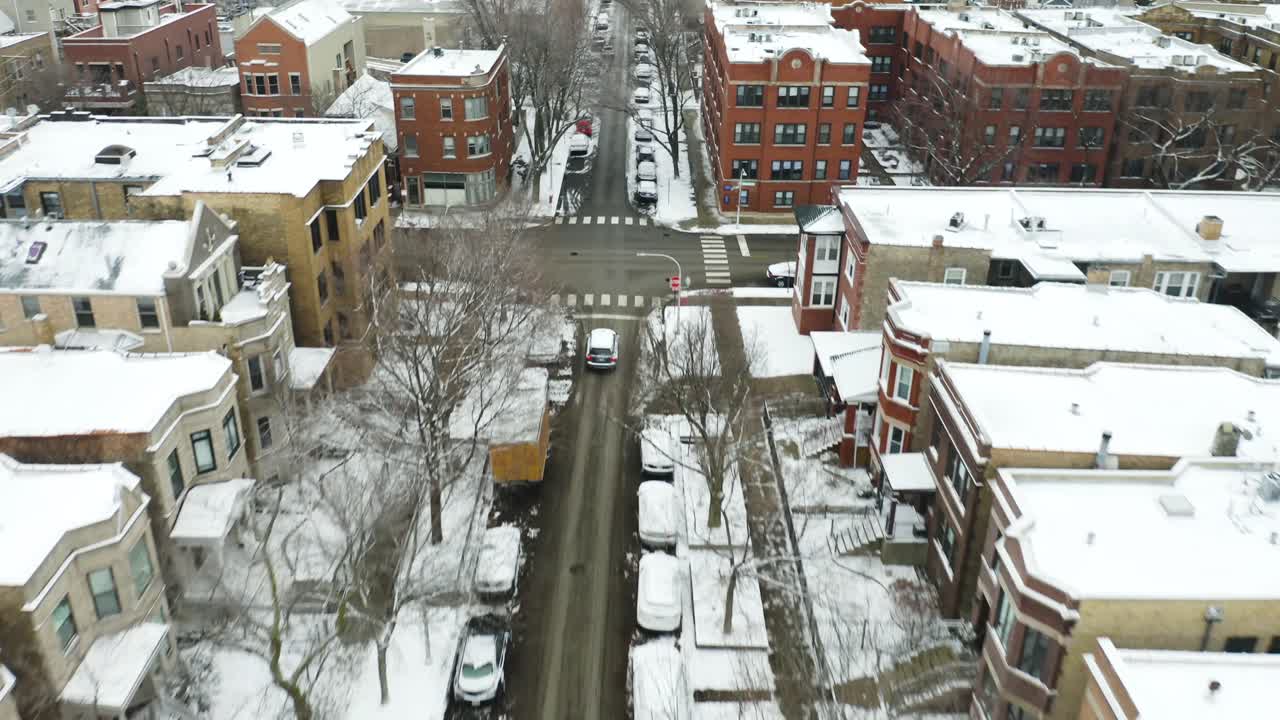 Birds Eye View of Cars Driving on Urban Road during Winter