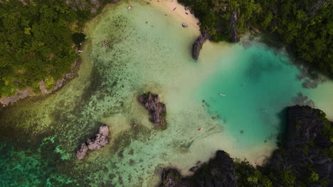 above view cadlao natural lagoon in el nido, palawan island, philippines. aerial drone shot