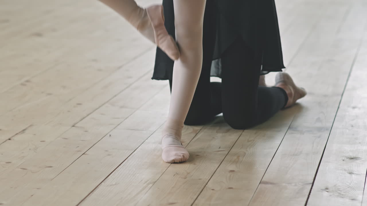 Little Girls Legs In Pointe Shoes Dancing