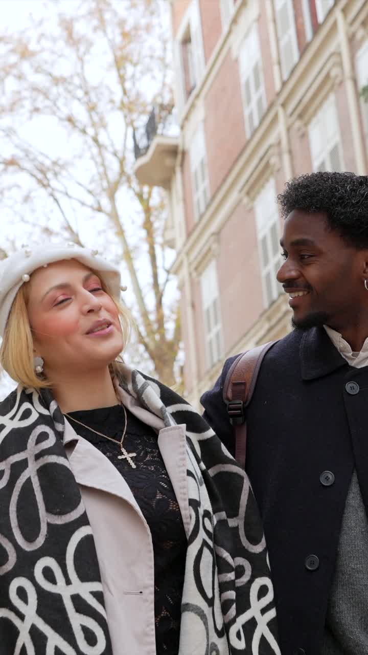 Couple walking on a city street